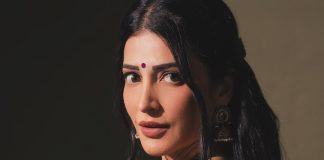 Shruti Haasan shruti haasan in Royal Deep Purple with Gold Accents Satin Silk saree paired with a matching low back embellished blouse photos
