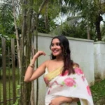 anikha surendran in onam set saree flower design photos