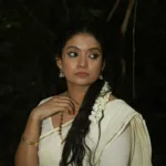anna ben in kerala saree with hairstyle photos 007