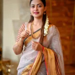 anusree in kanchipuram saree with traditional makeup look photos 004