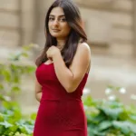 esther anil in maroon skin fit sleeveless gown photos