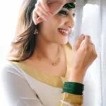 actress aditi ravi onam 2025 dress style photos