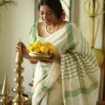 actress anumol onam saree 2025 photos 001