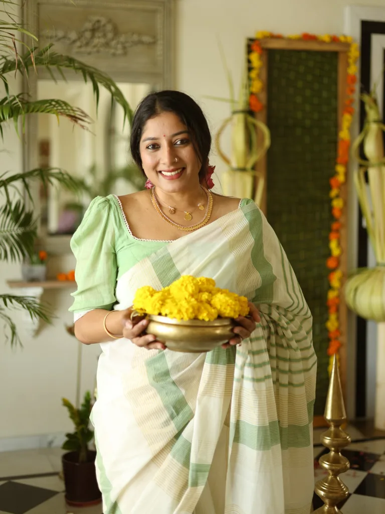actress anumol onam saree 2025 photos