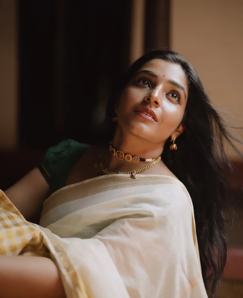 actress rajisha vijayan onam 2025 celebration in saree photos 001