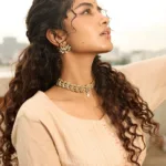 anupama parameswaran in Tissue cream colour churidar set photos 001