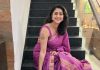 Kanika kaniha in rich vibrant shade of magenta accented with metallic gold or copper detailing saree photos