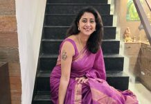 Kanika kaniha in rich vibrant shade of magenta accented with metallic gold or copper detailing saree photos