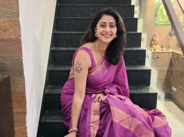 Kanika kaniha in rich vibrant shade of magenta accented with metallic gold or copper detailing saree photos