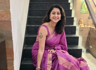 Kanika kaniha in rich vibrant shade of magenta accented with metallic gold or copper detailing saree photos