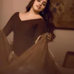 malavika c menon in brown party wear dress photos 004