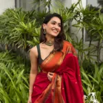 saniya iyappan in red and orange border saree photos