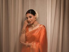 santhi mayadevi in orange pattu saree with matching jewellery photos