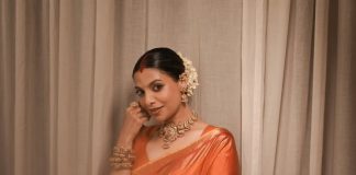 santhi mayadevi in orange pattu saree with matching jewellery photos