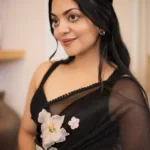 ahaana krishna in glass tissue saree in a black shade photos 012
