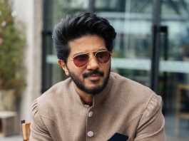 dulquer salmaan in Indo Western layered jacket and trouser combination dress photos