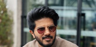 dulquer salmaan in Indo Western layered jacket and trouser combination dress photos