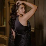 parvathy thiruvothu in black party wear net saree photos 001