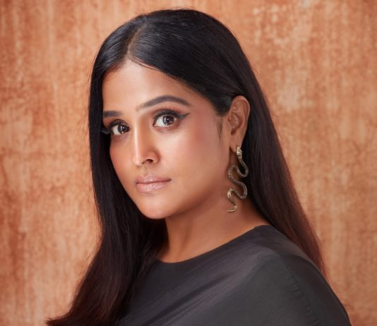 Remya Nambeesan remya nambeesan in black outfit paired with snake themed earrings photos