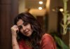nikki galrani in Tussar silk rust red with warm metallic gold saree and high round neckline blouse and Styled with traditional gold jewelry photos