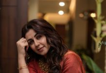 Nikki Galrani nikki galrani in Tussar silk rust red with warm metallic gold saree and high round neckline blouse and Styled with traditional gold jewelry photos