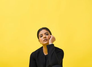 aishwarya rajesh in Modern Black Pant Suit Ensemble paired with bright orange pointed heels for contrast