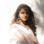 nikhila vimal in Soft blush pink base with muted sage green and dusty rose accents Traditional three piece ethnic Salwar Kameez relaxed fit straight kurta adorned with block printed floral top