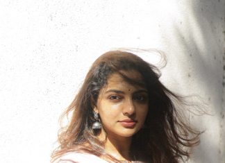 nikhila vimal in Soft blush pink base with muted sage green and dusty rose accents Traditional three piece ethnic Salwar Kameez relaxed fit straight kurta adorned with block printed floral top