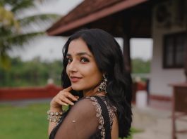 Rajisha Vijayan Actress Rajisha Vijayan A fitted sleeveless V neck crop top and dark Lehenga photos