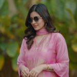 anju kurian in contemporary pastel pink ethnic suit set consisting of a straight cut kurti matching trousers and a dupatta photos