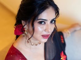 Anna Reshma Rajan anna rajan in sheer dark navy blue saree with contrasting bright crimson red short sleeved blouse photos