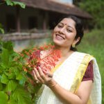 anumol in traditional kerala setsaree with blouse combination pics