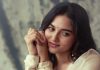 kayadu lohar in Muted ivory off white and pale gold tones Elegant ethnic Sharara and softly defined eyes with thin black eyeliner and nude pink satin lipstick