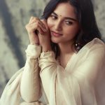 kayadu lohar in Muted ivory off white and pale gold tones Elegant ethnic Sharara and softly defined eyes with thin black eyeliner and nude pink satin lipstick