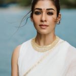 nayanthara in white saree with jasmine flower look pics