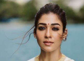 nayanthara in white saree with jasmine flower look pics