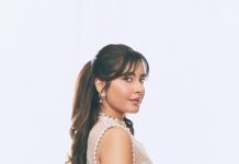 raashi khanna in lightweight sheer white fabric saree with matching sleeveless blouse with a sheer mesh illusion neckline photos