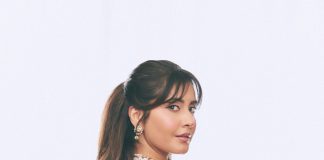 raashi khanna in lightweight sheer white fabric saree with matching sleeveless blouse with a sheer mesh illusion neckline photos