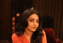 rajisha vijayan in orange colour jugalbandi outfit photos