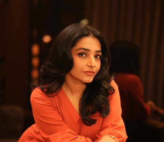 rajisha vijayan in orange colour jugalbandi outfit photos