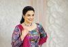 shweta menon in multi colored geometric and brocade style jacket style peplum top with dual tone color flared lehenga with heavy vertical pleating