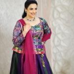 shweta menon in multi colored geometric and brocade style jacket style peplum top with dual tone color flared lehenga with heavy vertical pleating