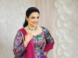 Shweta Menon shweta menon in multi colored geometric and brocade style jacket style peplum top with dual tone color flared lehenga with heavy vertical pleating