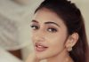 sreeleela in Ivory colour saree with multicolour border and tube style matching embroidered blouse pics