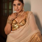 Close up Kasavu saree jewelry pose traditional jhumka