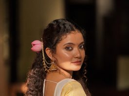 10 Trending Onam Saree Pose Ideas Inspired by South Indian Celebrities Side profile candid glance in traditional Kerala saree