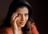Aishwarya Rajesh aishwarya rajesh in rust orange terracotta long sleeved sweater with relaxed fit blue jeans with heavy knee distressing pics