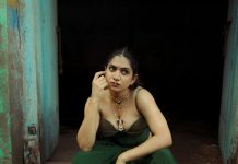 Anarkali Marikar anarkali marikar in Indo western fusion ensemble consisting of a structured olive green corset top with thin straps and cupped satin detailing at the bust paired with dark green flared skirt