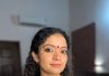 anna ben in red simple kara set and mundu kerala traditional dress and makeup pics