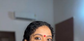 Anna Ben Nayarambalam anna ben in red simple kara set and mundu kerala traditional dress and makeup pics
